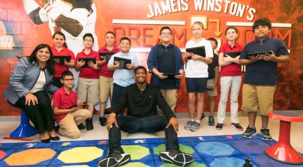 Jameis Winston's Dream Forever Foundation Photo with Kids