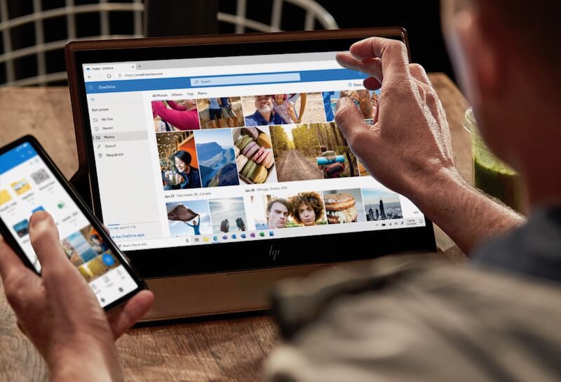onedrive for business features photo of laptop and phone screen