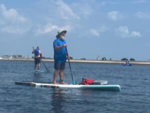 Tom Flammia paddle boarding