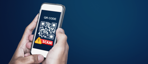 QR code phishing phone in hand scam message photo