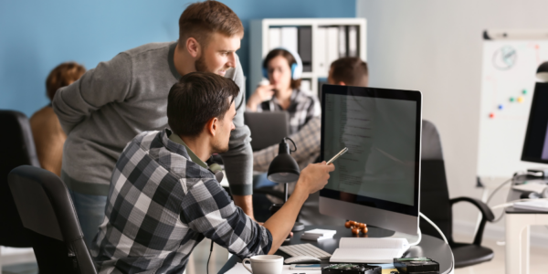 Microsoft Changes header image photo of men at computer